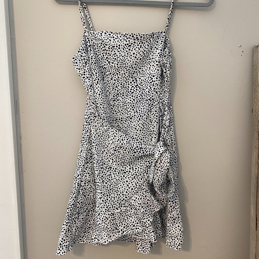 Black and white polka dot wrap dress